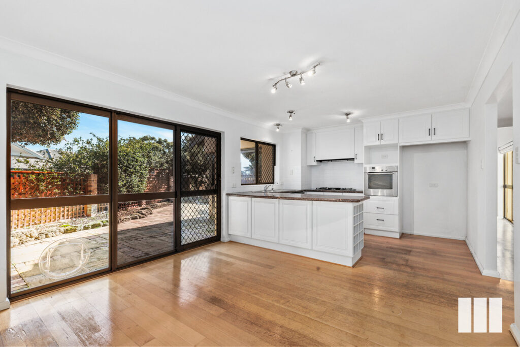TERRIFIC TOWNHOUSE JUST A STROLL FROM THE RIVER