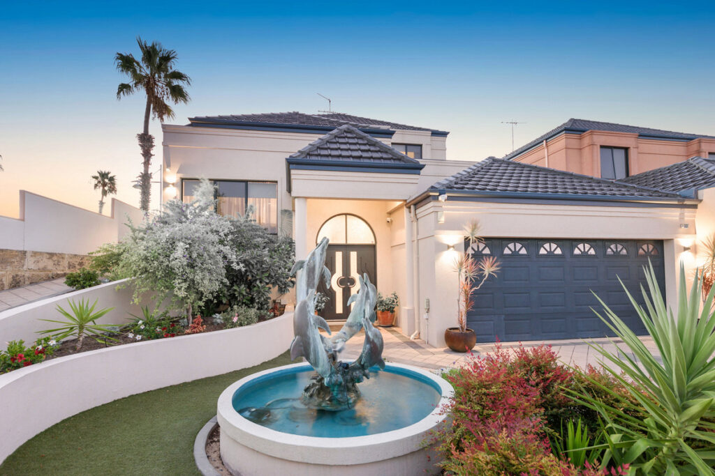 LUXURY WATERFRONT MANSION WITH 180 DEGREE VIEWS FROM ALL 3 LEVELS