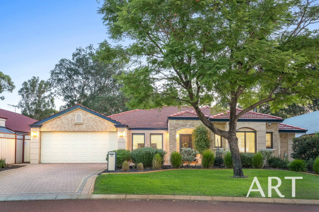 REFINED FAMILY RESIDENCE FRAMED BY THE FAIRWAYS