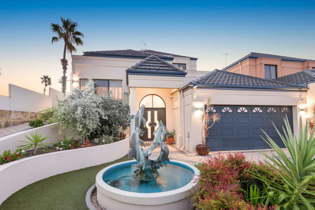 LUXURY WATERFRONT MANSION WITH 180 DEGREE VIEWS FROM ALL 3 LEVELS